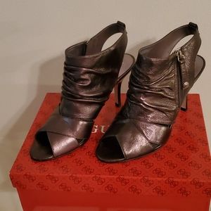 Women's size 9M Guess heels color Pewter leather.